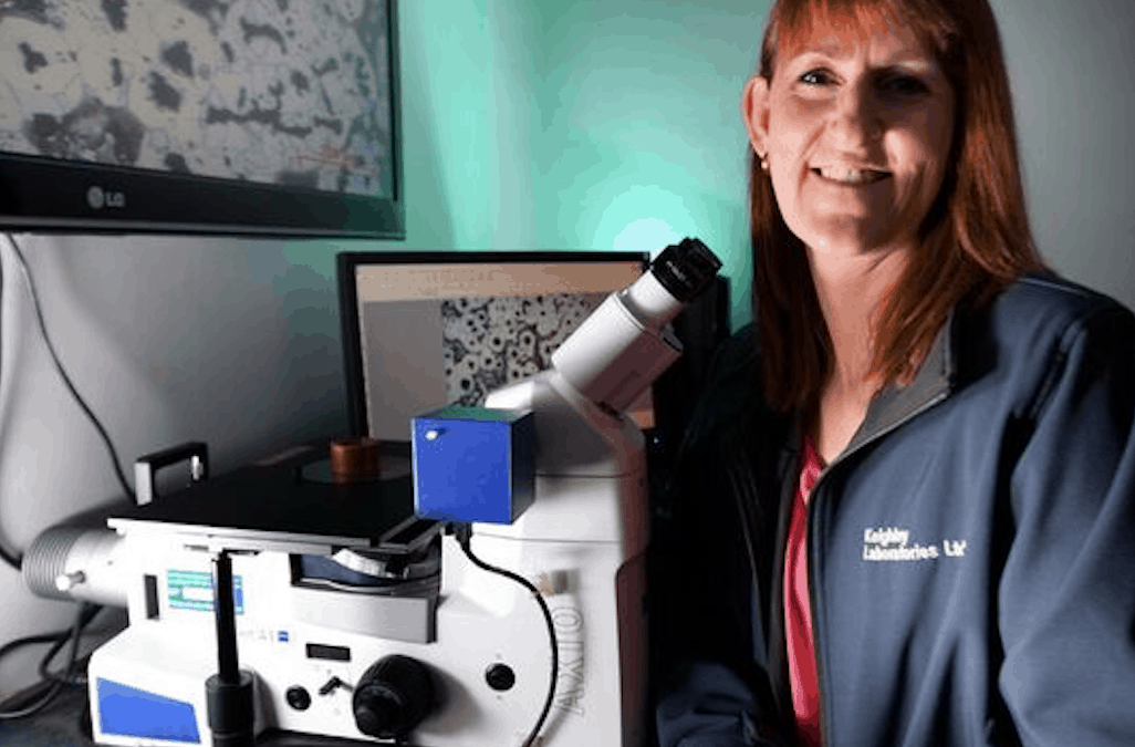 Debbie Mellow with microscope