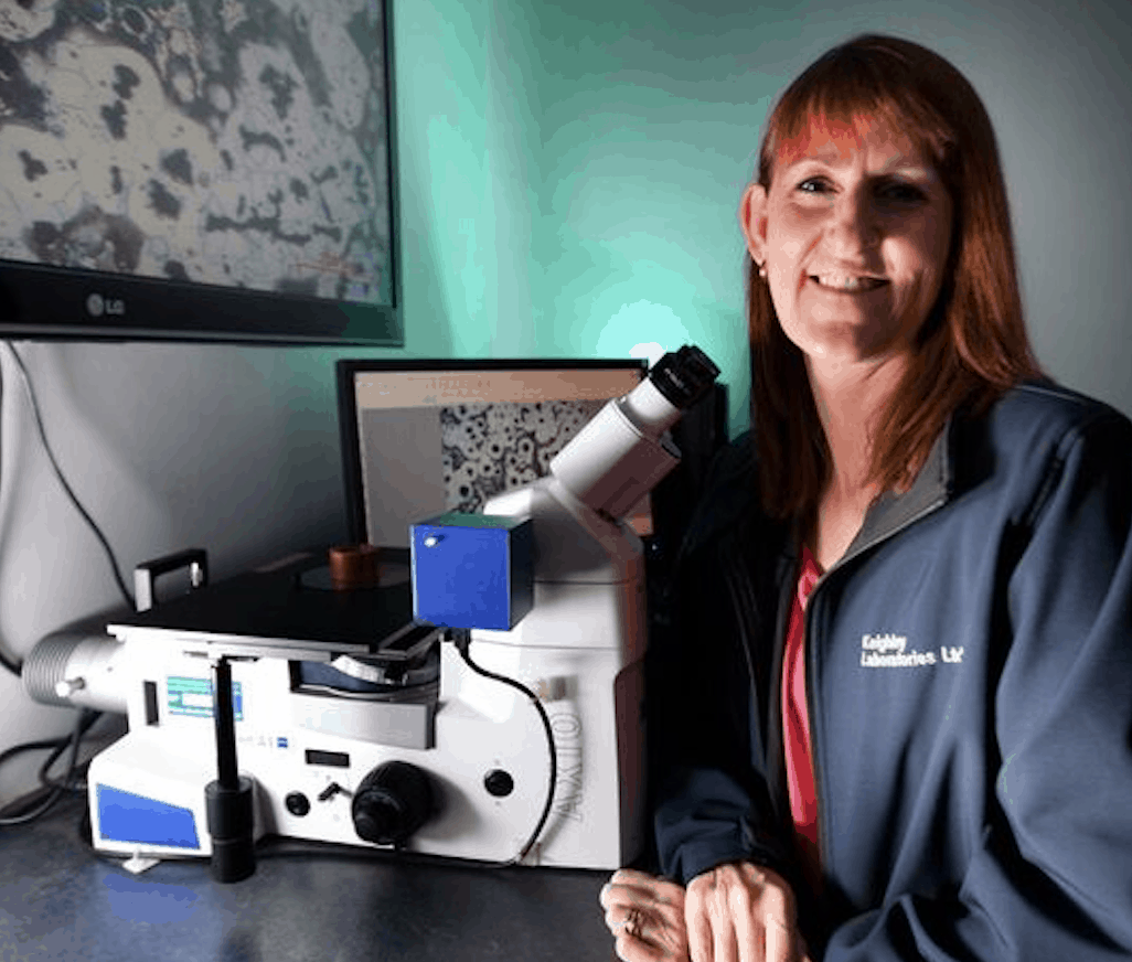Debbie Mellow with microscope